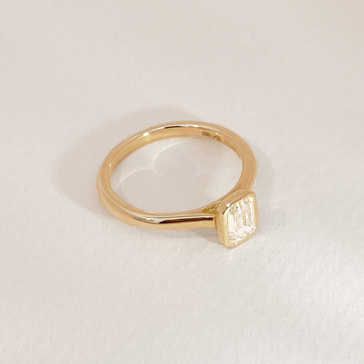 Golden Emerald Diamond Bezel Ring