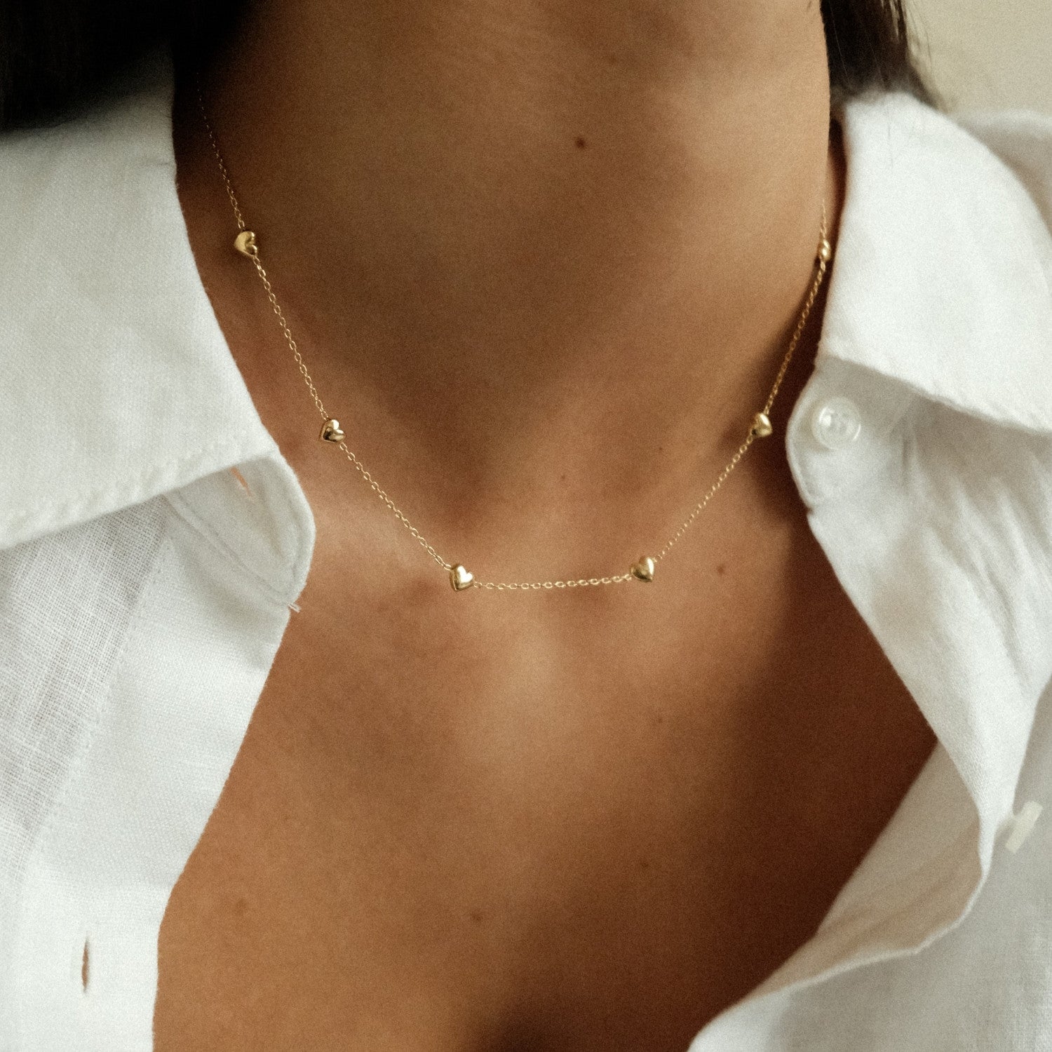 Gouden ketting met hartjes