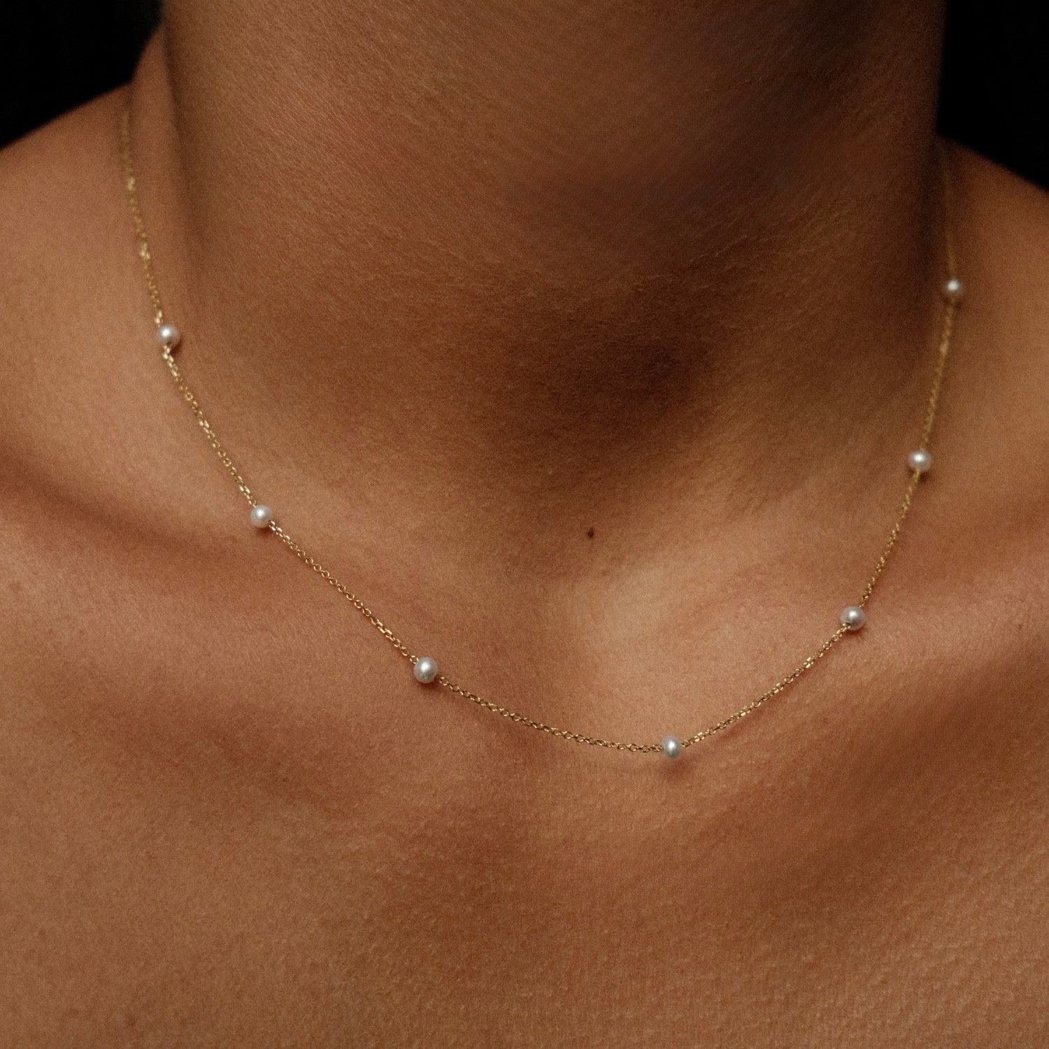 Gouden ketting met pareltjes