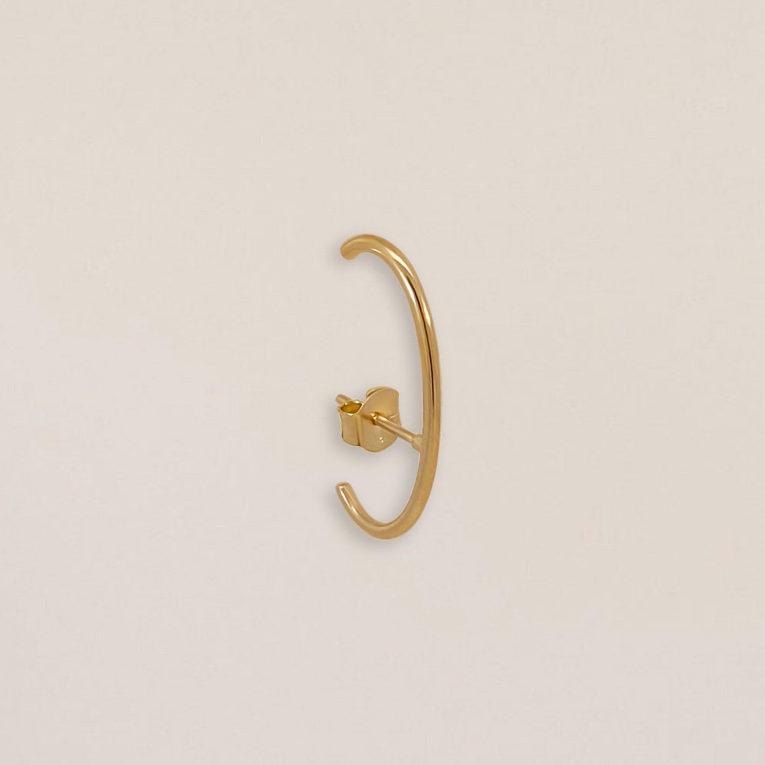 Gouden suspender oorbel