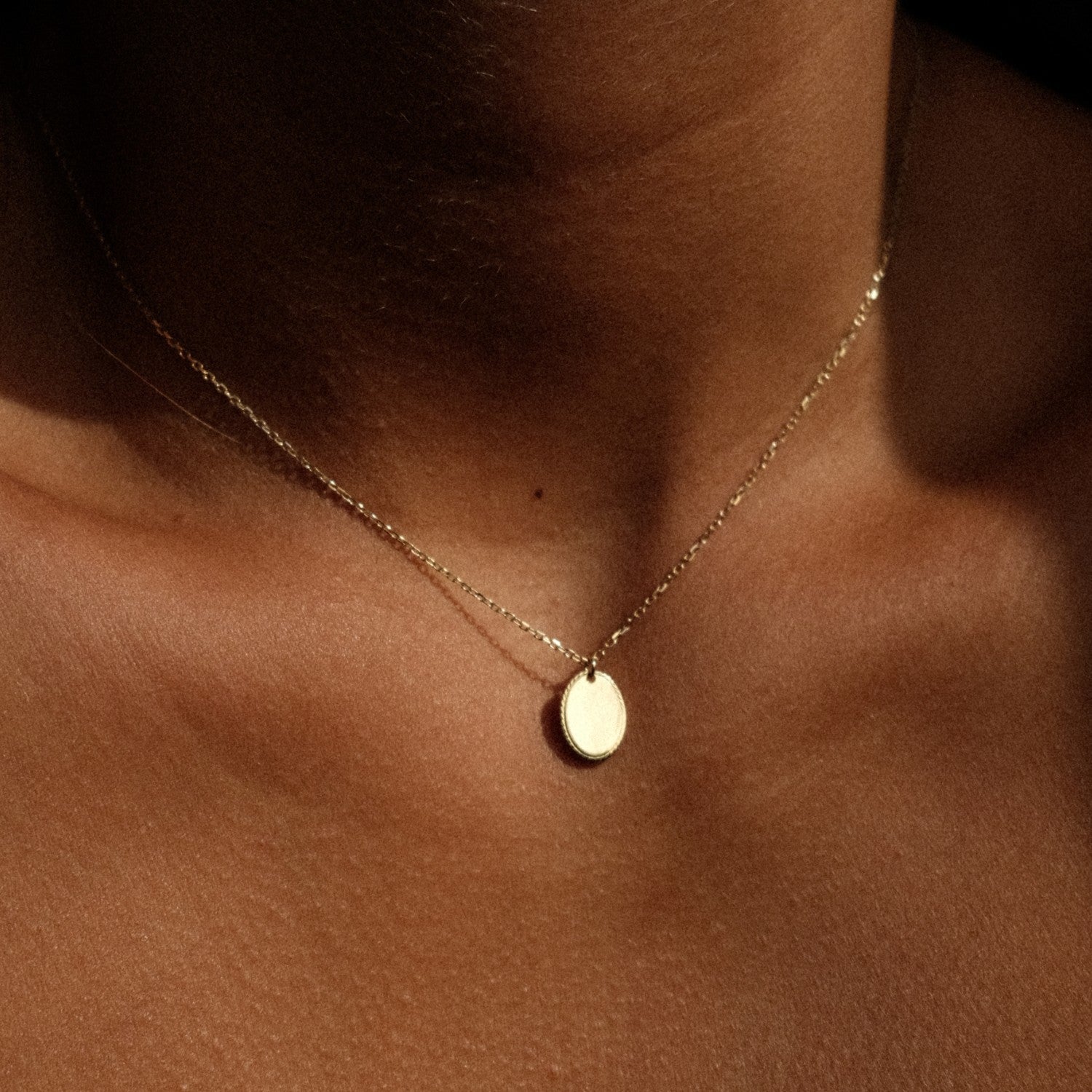 Ketting met ovaal plaatje