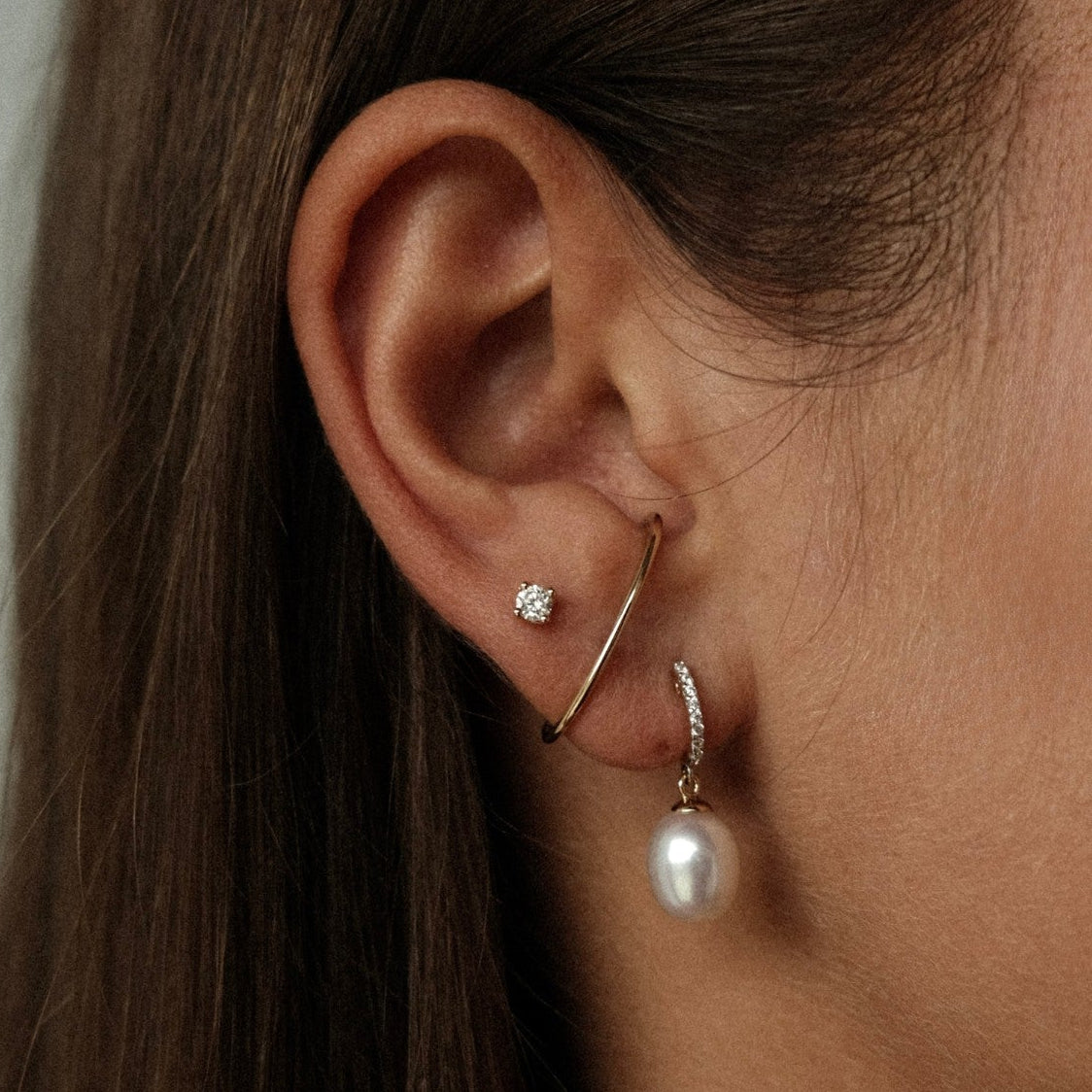 Suspender and pearl earring combination