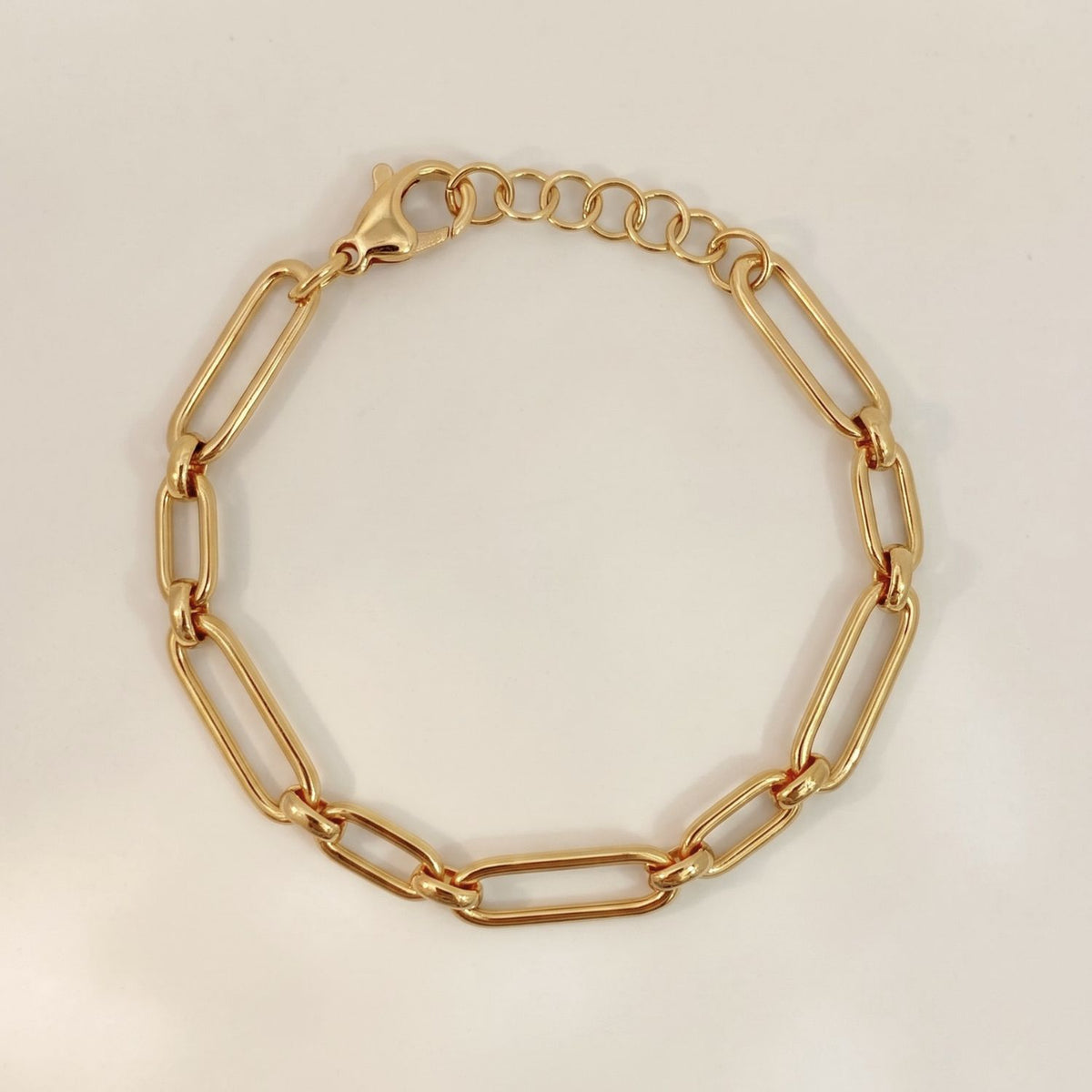 Unieke schakelarmband verguld