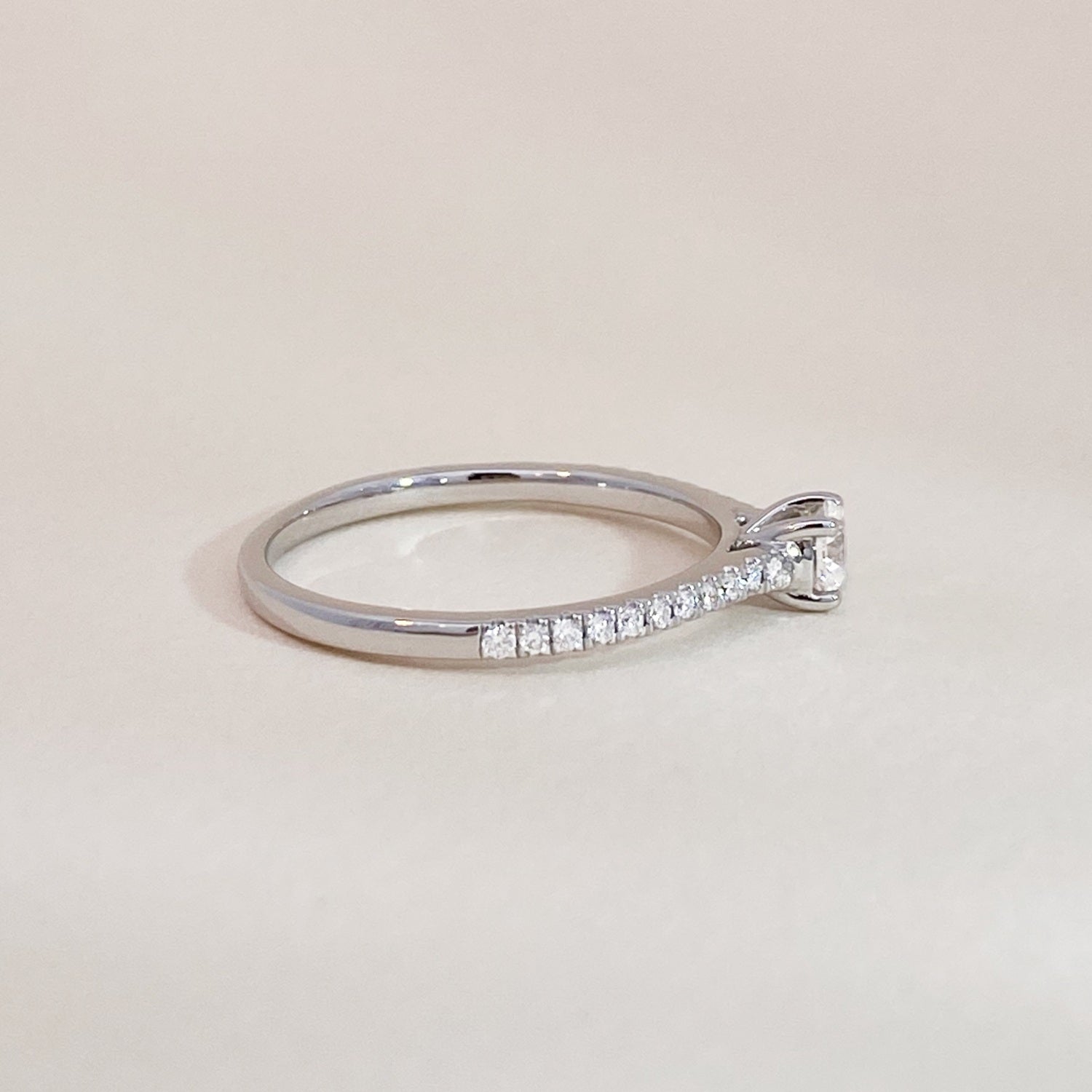 White Gold Solitaire on Diamonds Ring