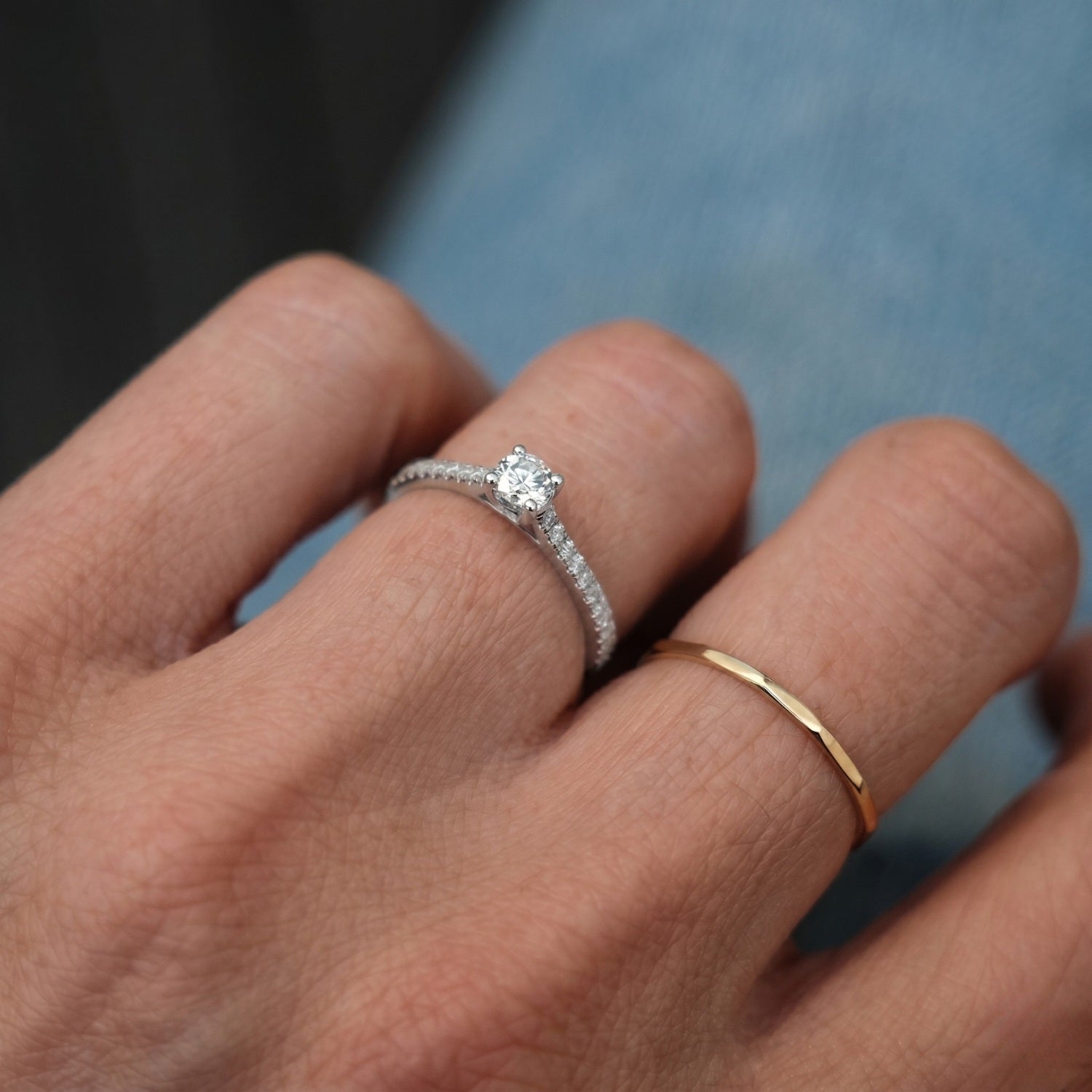 White Solitaire on Diamonds Ring