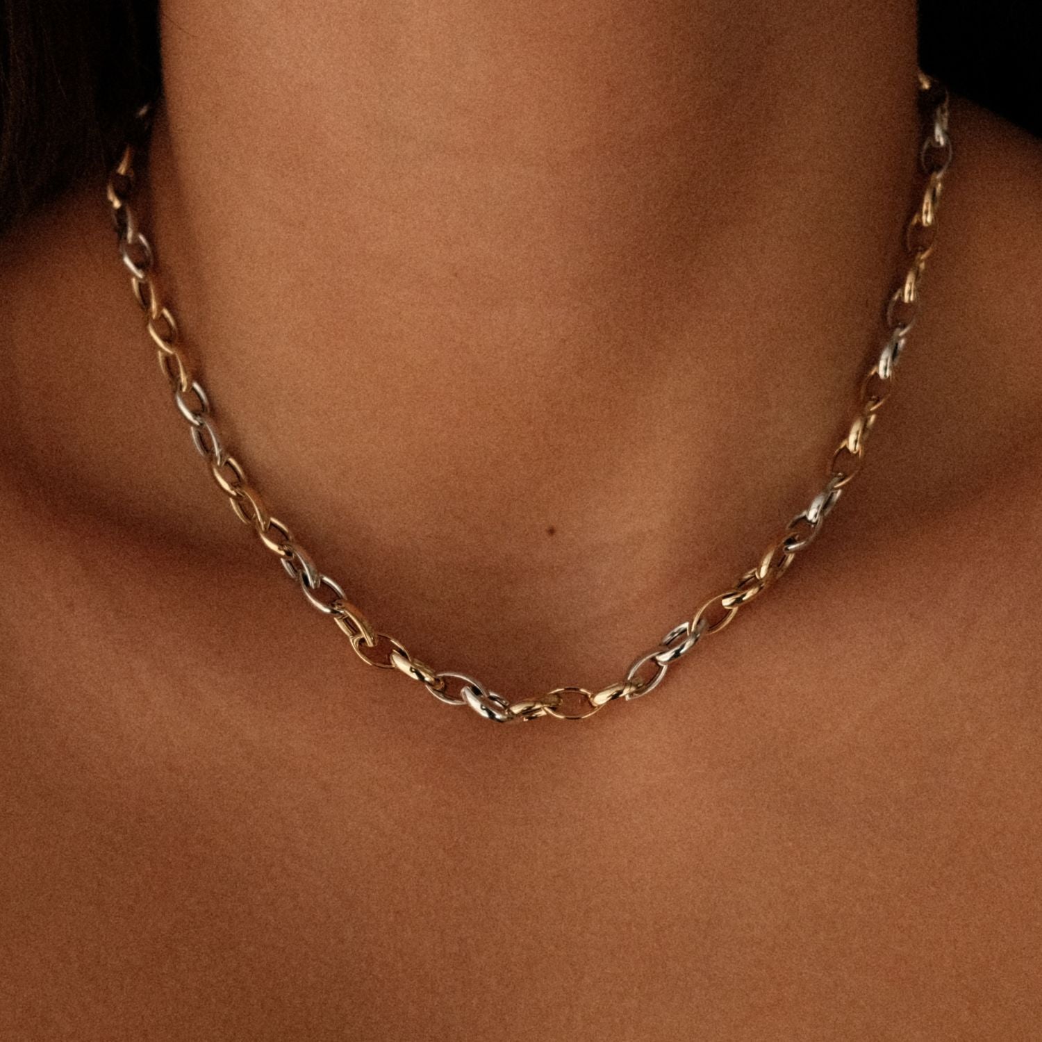 Wit en geelgouden schakelketting