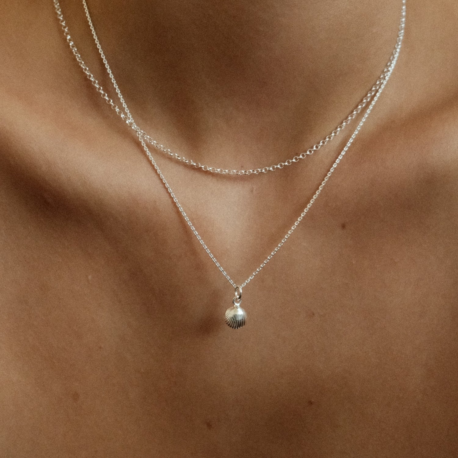 Zilveren ketting met schelpje