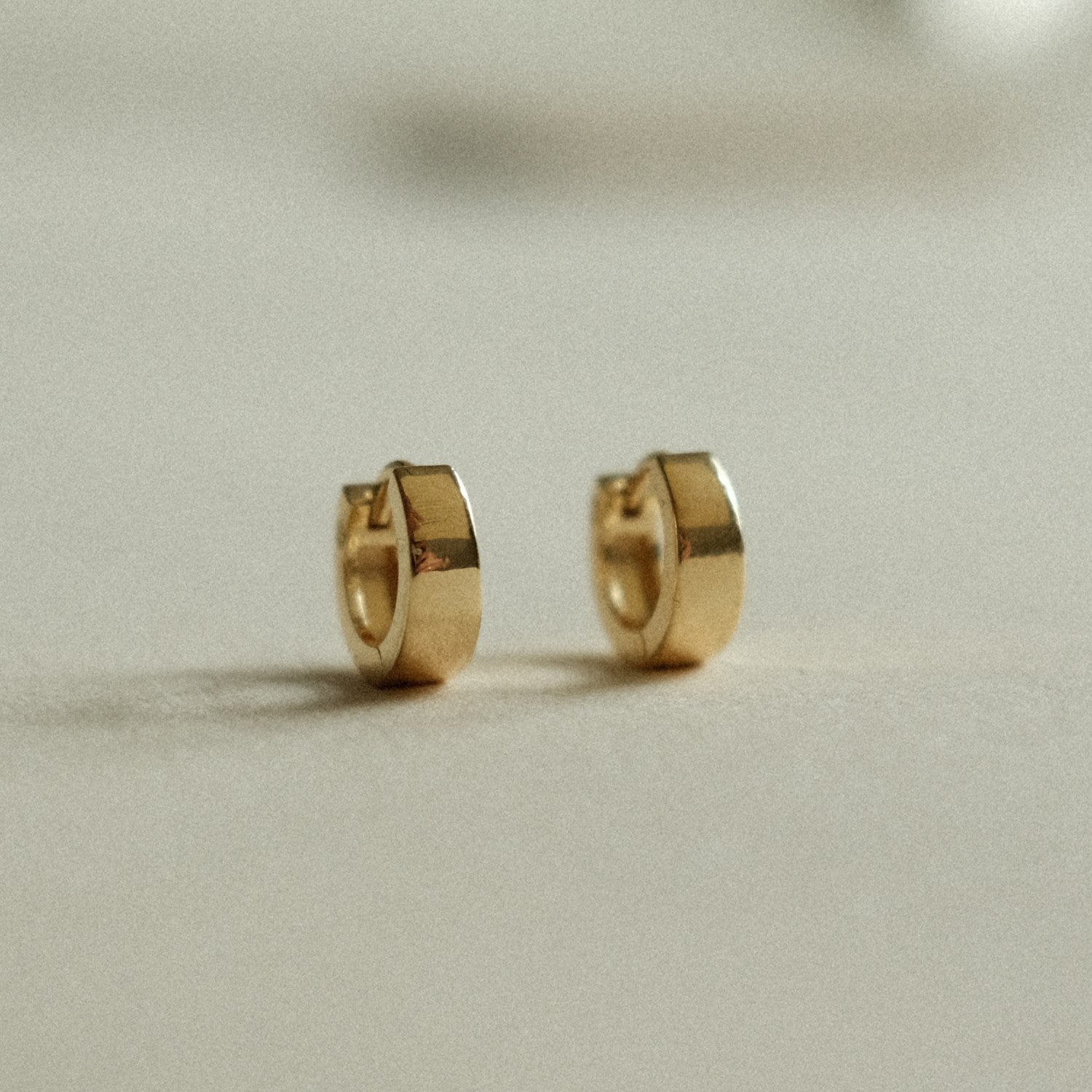 clean huggie earrings