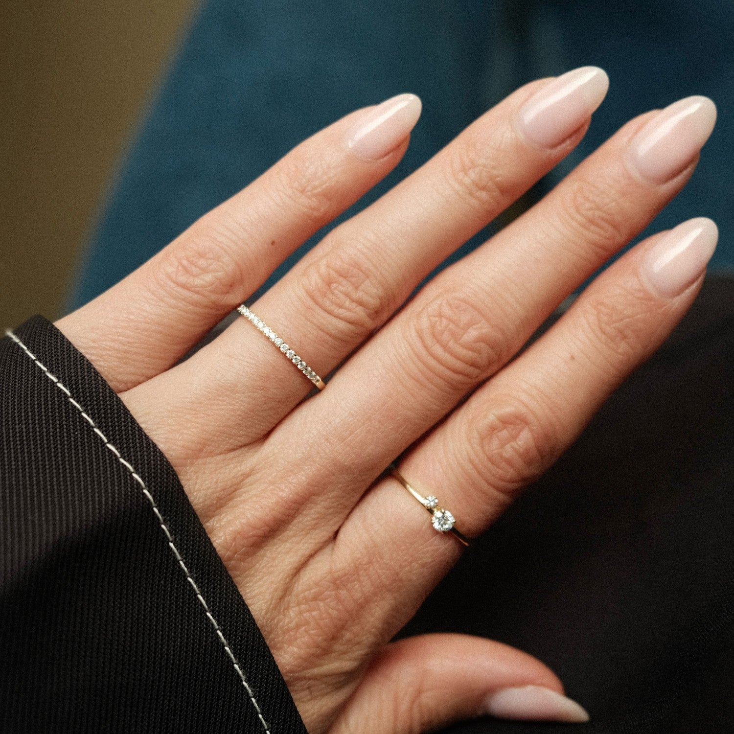 Delicate diamond row ring