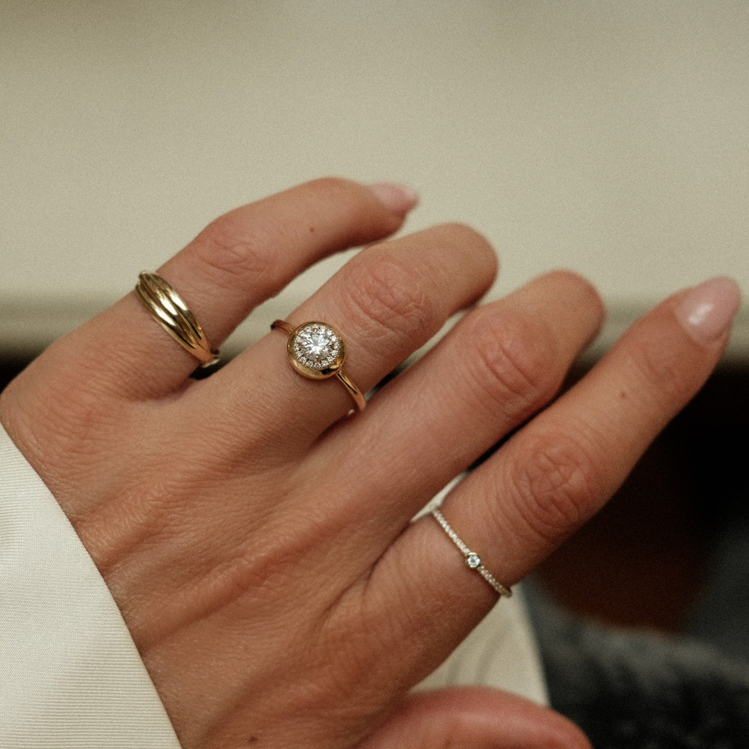 Diamond button ring and golden trio ring
