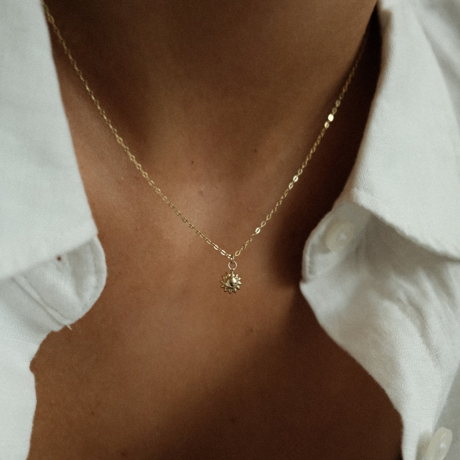 Gouden ketting met zonnetje