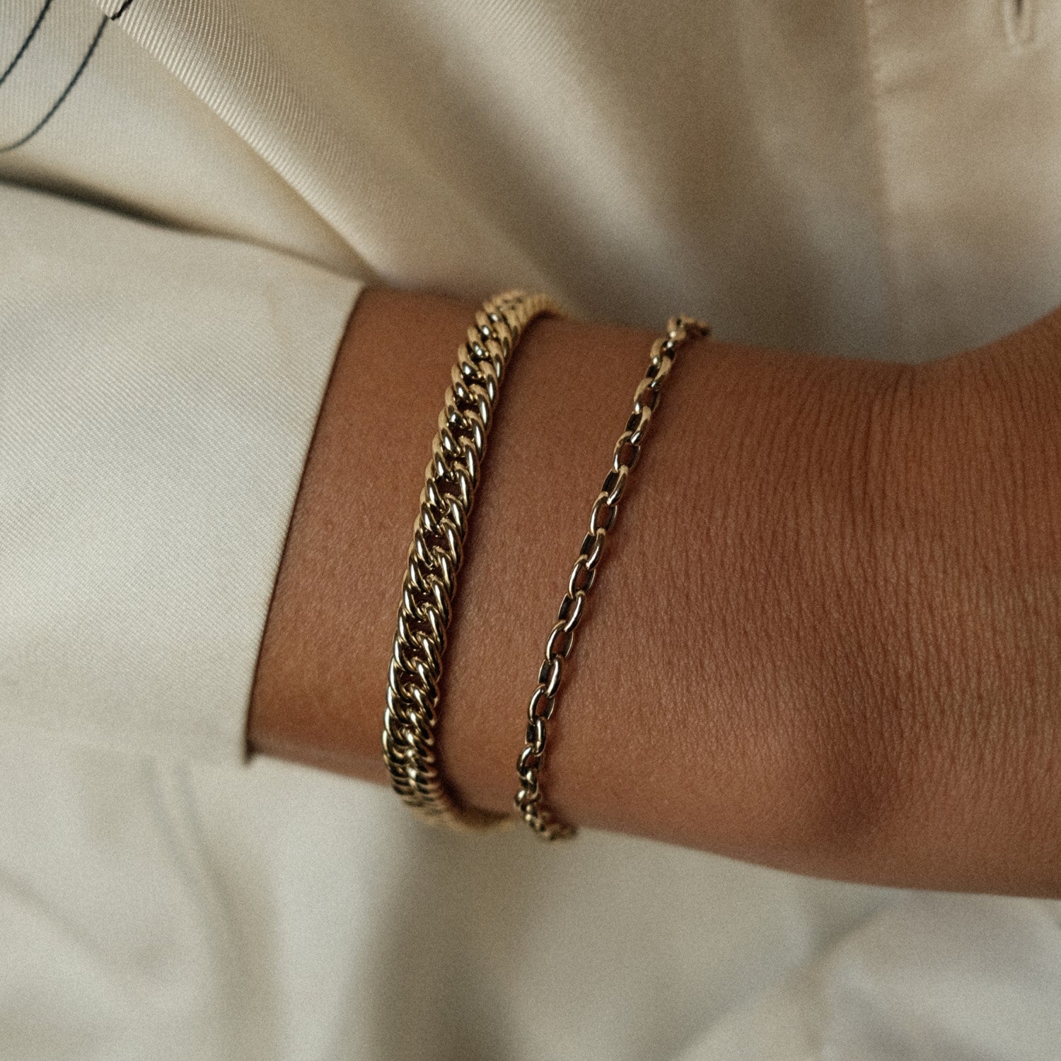 Gouden schakelarmbanden
