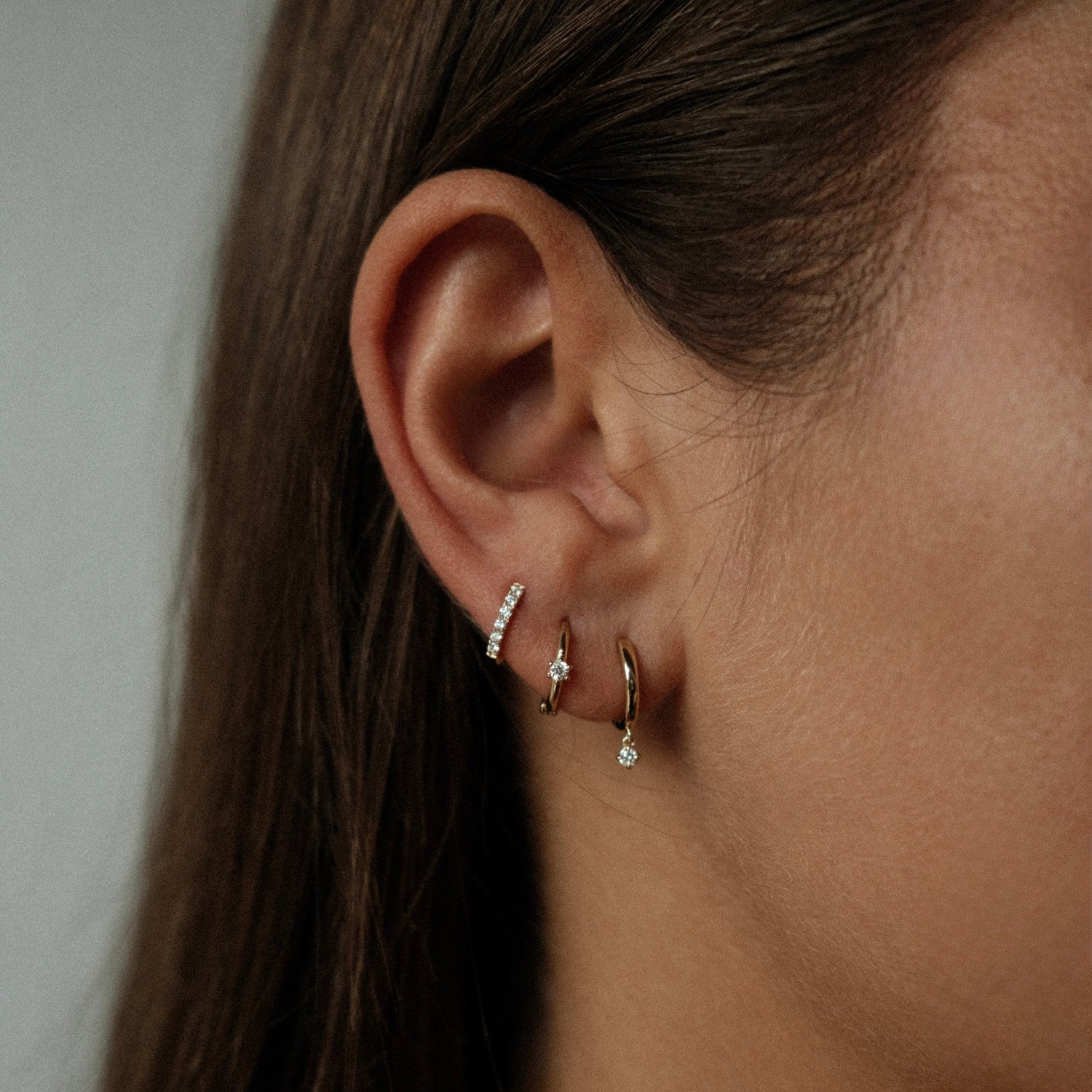 Huggie oorbellen combinatie