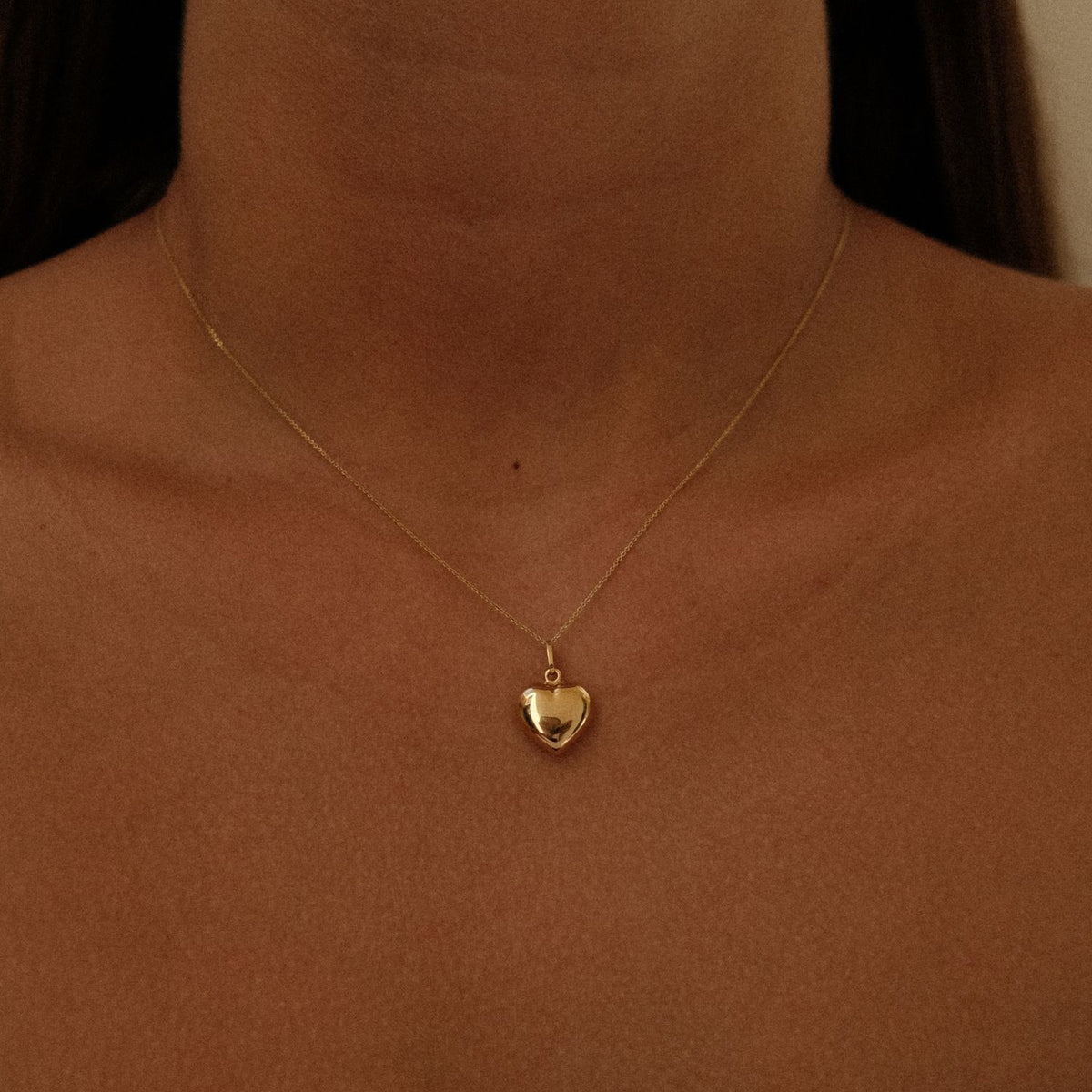 Polished heart pendant medium 14k