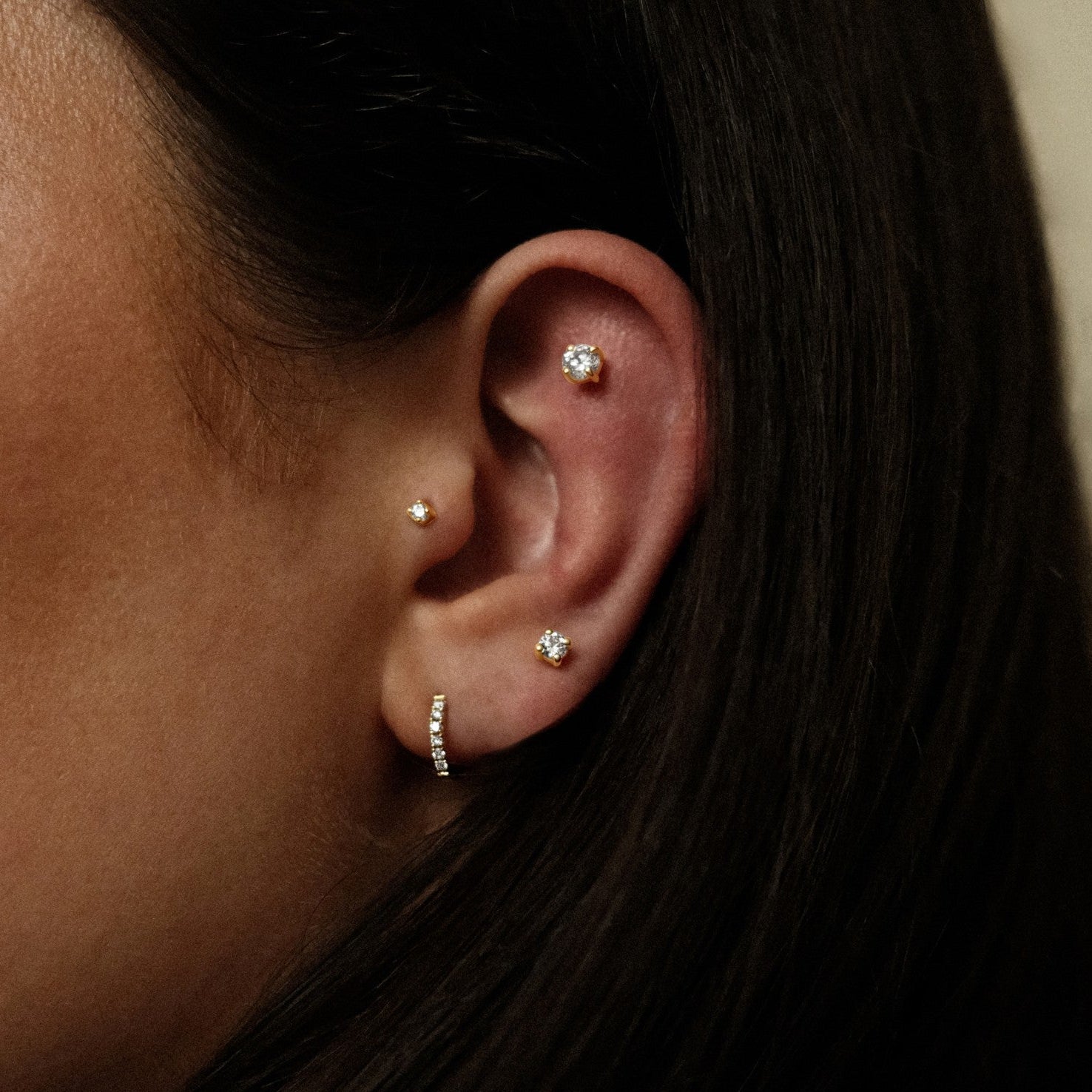 Ronde piercings met steentjes