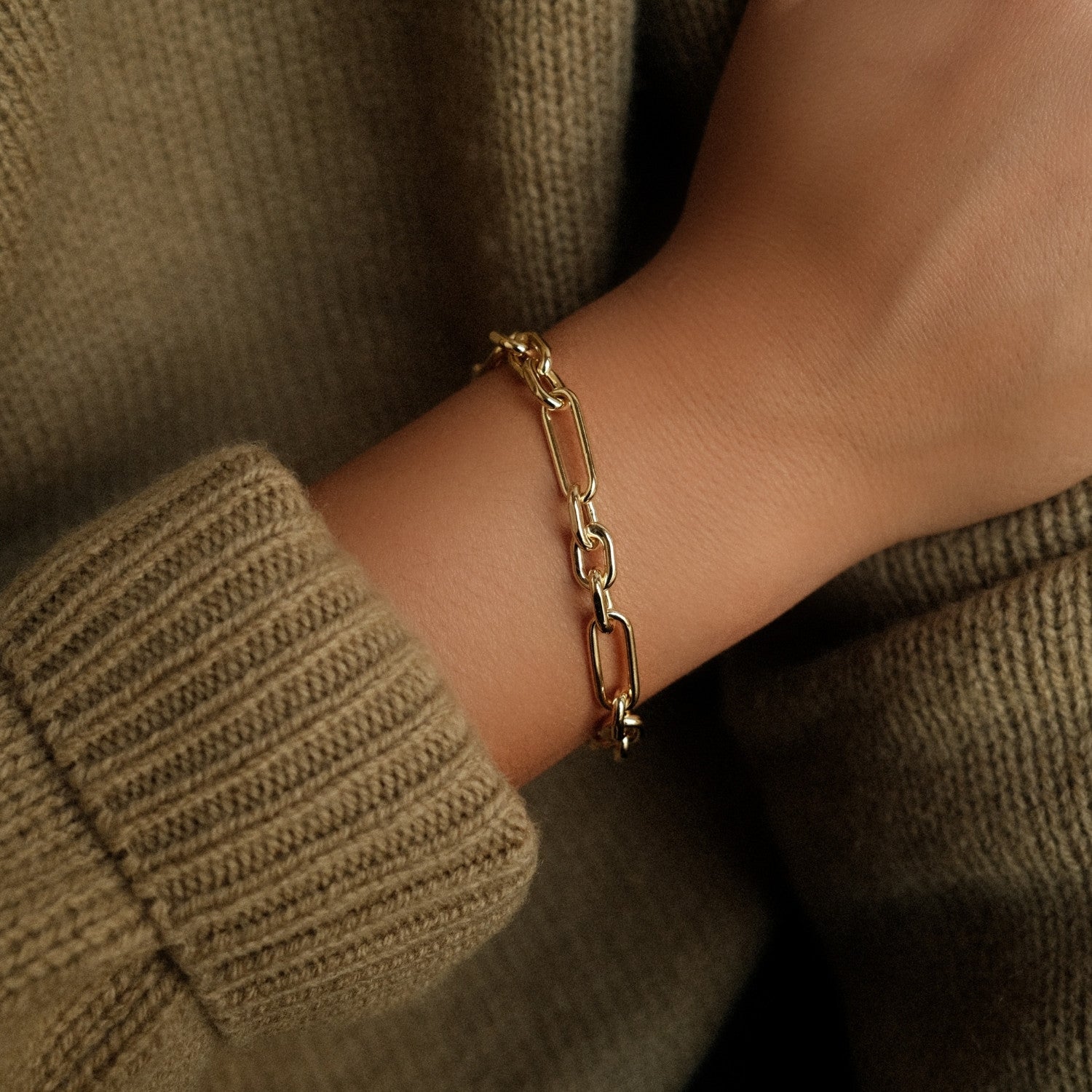 Ronde schakelarmband goud