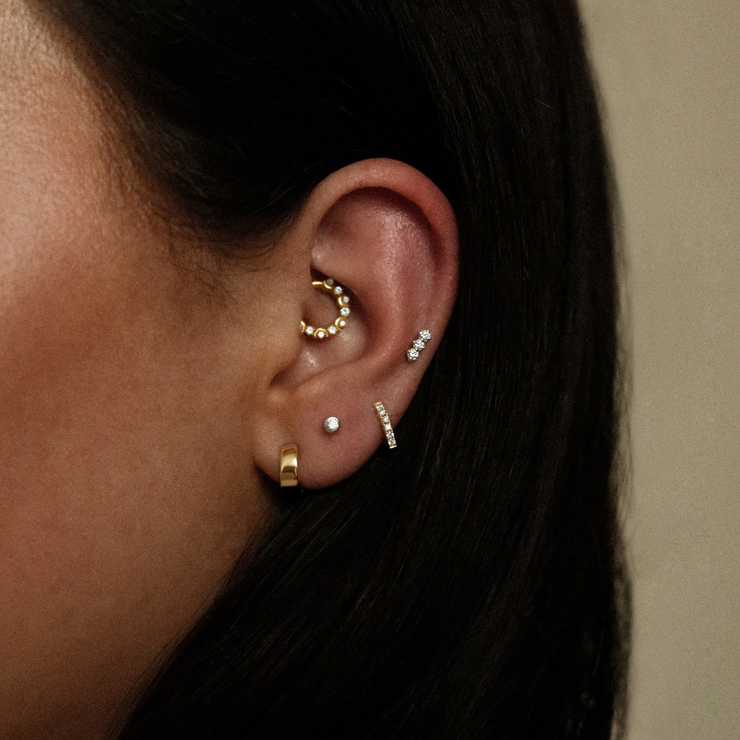 Silver and gold piercing look