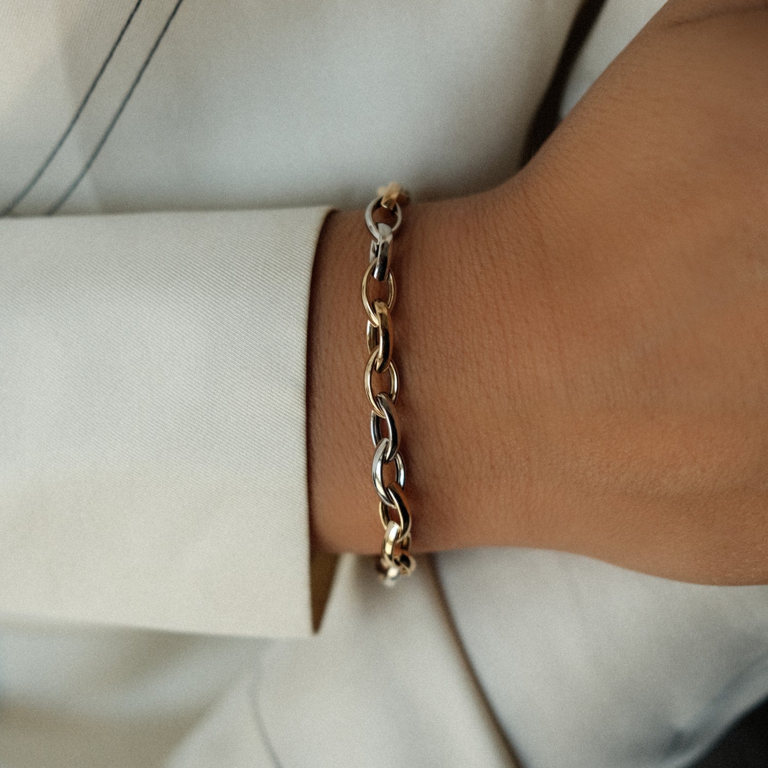 Witgoud en geelgoud armband