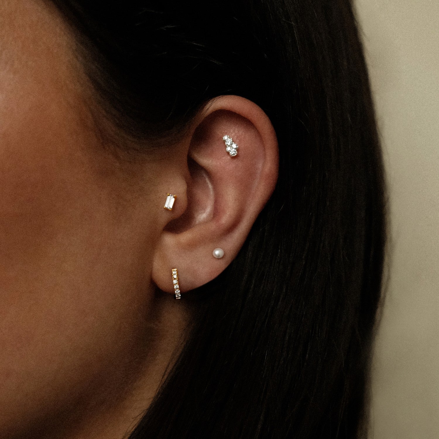 Zilver en gouden piercing combinatie